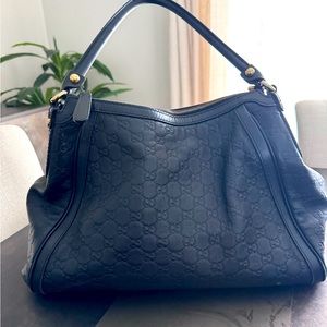 Authentic Gucci Black Leather GG Embossed with Gold Hardware
